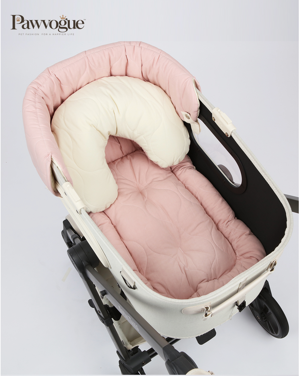 Doggie stroller with pink and cream color on a light gray background